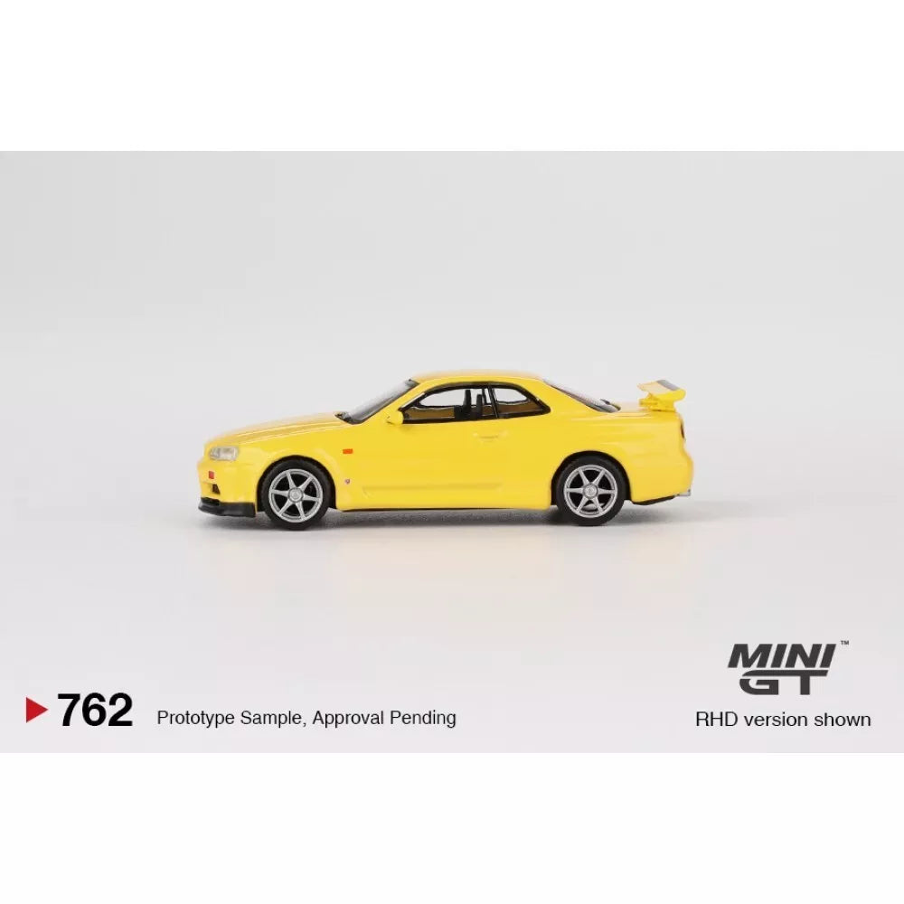 Mini GT Nissan Skyline GT-R (R34) V-SPEC Lightning Yellow (RHD) #762