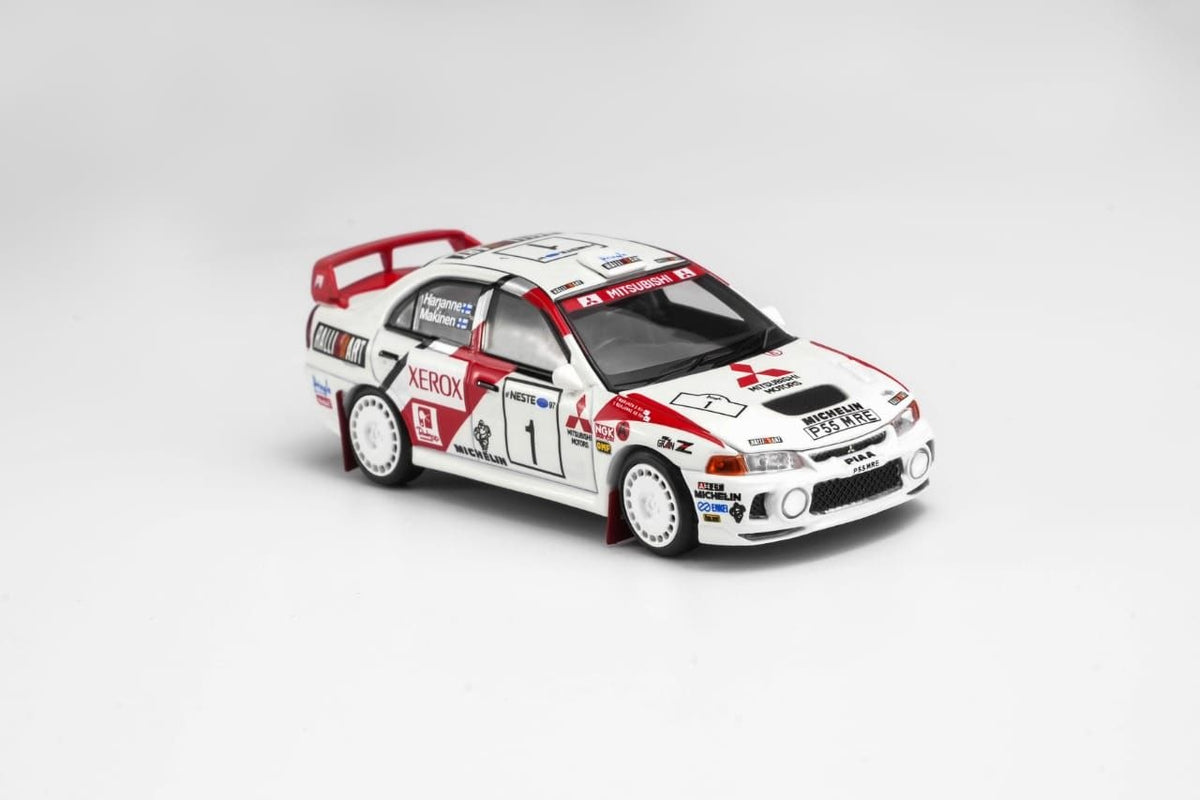 MotorHelix 1:64 1997 Mistubishi EVO4 GSR Champion of WRC Finland White/Red