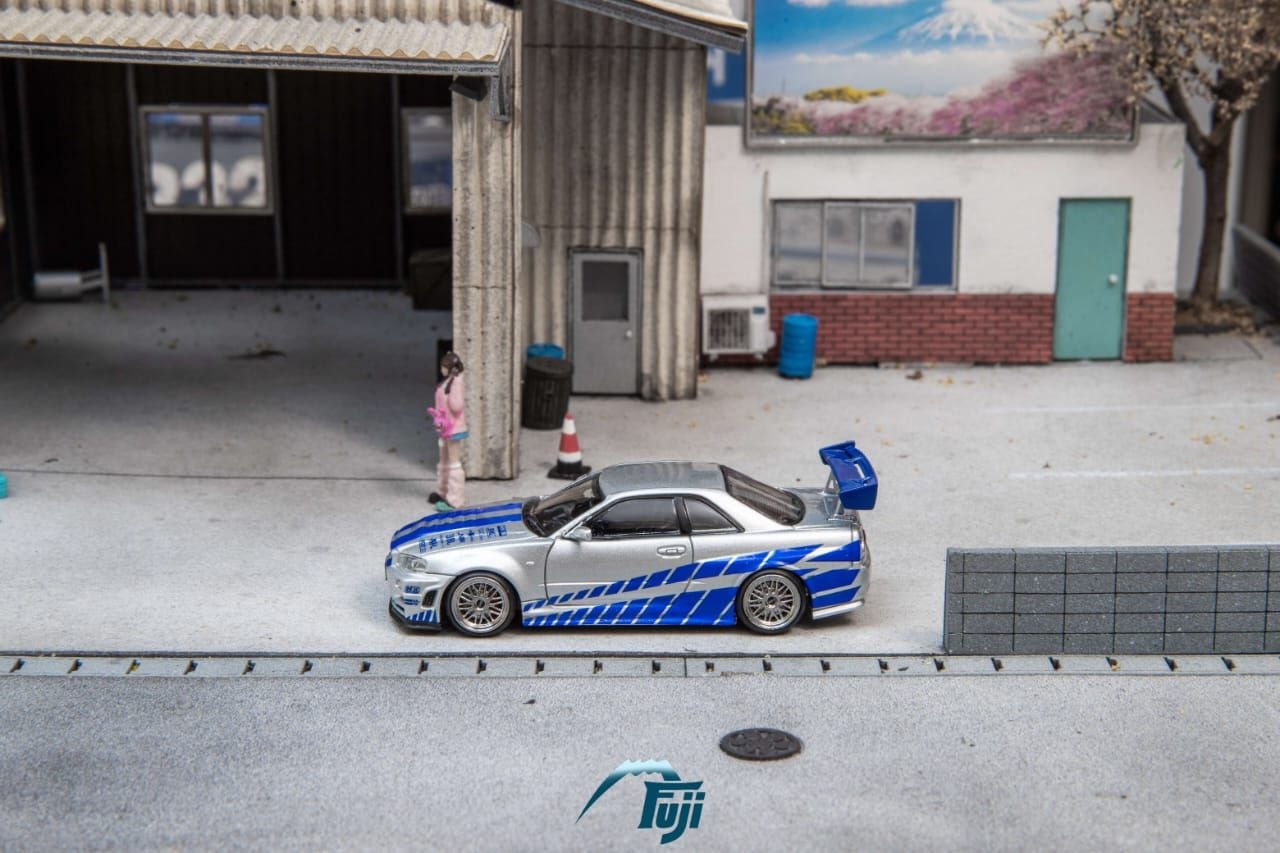 Fuji 1:64 Diecast Skyline R34 GT-R Nismo Z-Tune Silver/Blue Livery