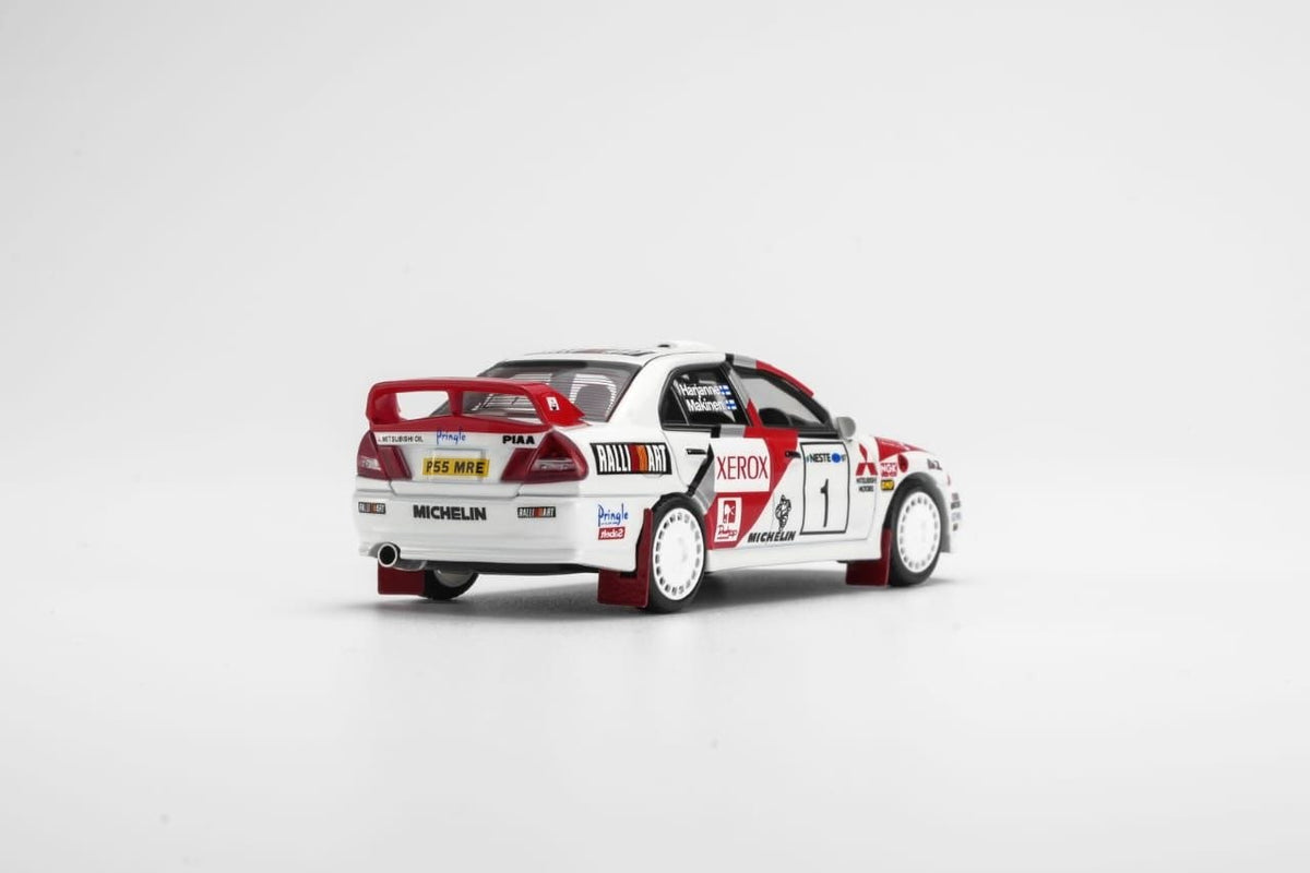 MotorHelix 1:64 1997 Mistubishi EVO4 GSR Champion of WRC Finland White/Red