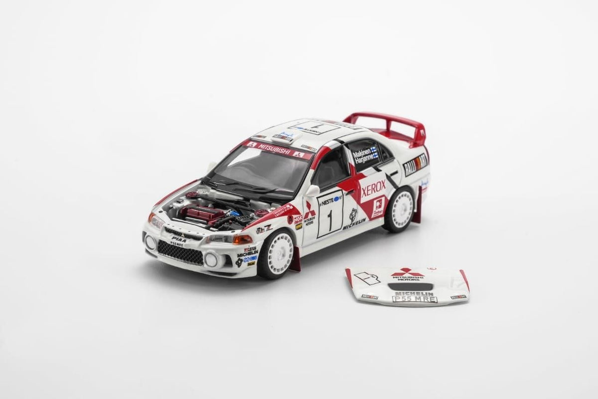 MotorHelix 1:64 1997 Mistubishi EVO4 GSR Champion of WRC Finland White/Red