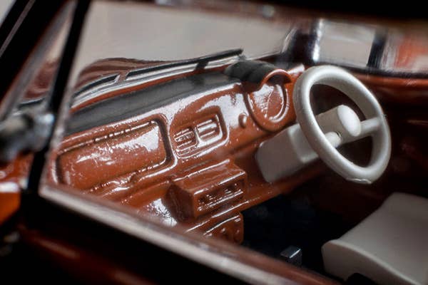 Tomica Limited Vintage 1:64 1989 Nissan PAO Terracotta