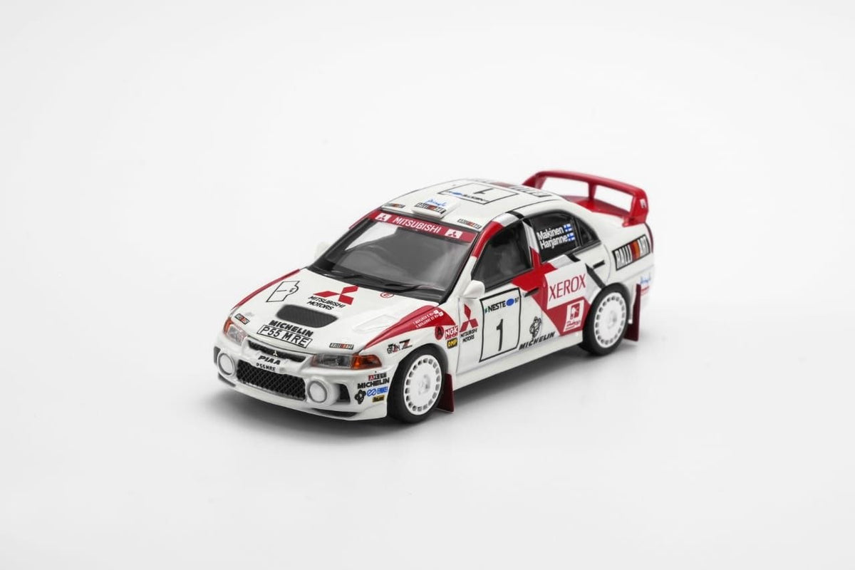 MotorHelix 1:64 1997 Mistubishi EVO4 GSR Champion of WRC Finland White/Red
